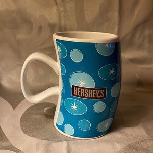 Hershey mug with blue bubbles and white handle